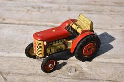 Early wind up tin tractor