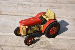 Early wind up tin tractor