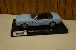 1965 Mustang Convertible diecast car on stand