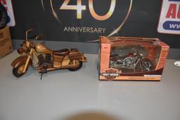 (2) Motorcycle advertising items to include 2004 V-Rod Harley Davidson die cast