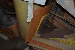 Contents in balcony area at south end of building including used diamond tread truck toolboxes, down