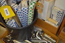 Several boxes of chrome/ brass drain parts