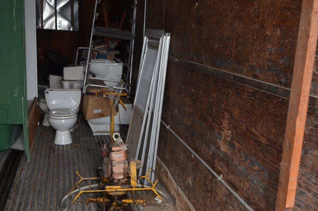 Contents of north storage trailer: toilets, concrete power trowel as is, marble, Please note new