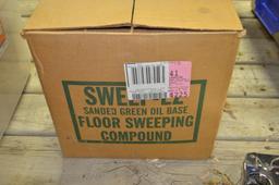 Nearly full box of sweeping compound