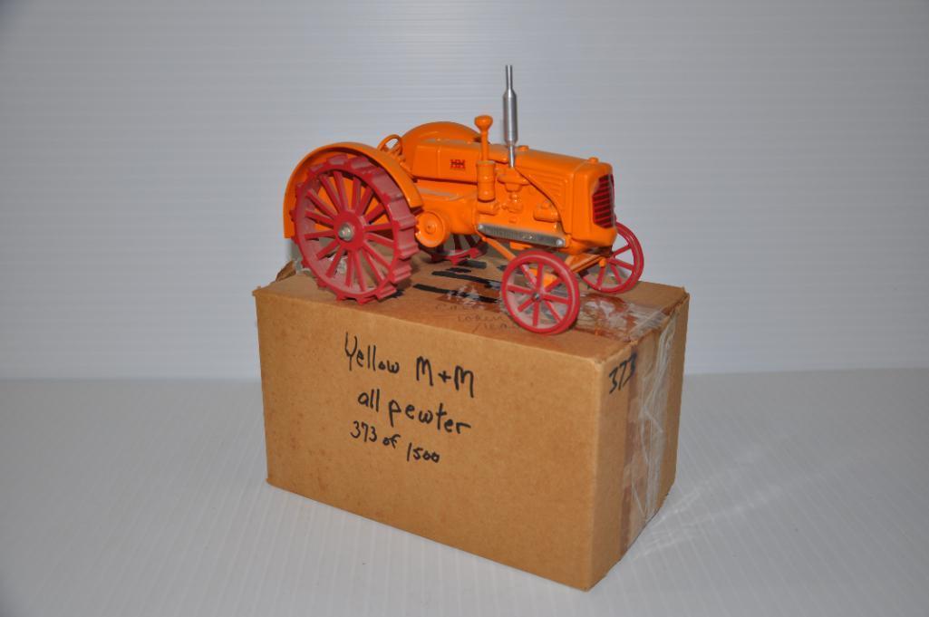 Minneapolis Moline yellow pewter toy tractor