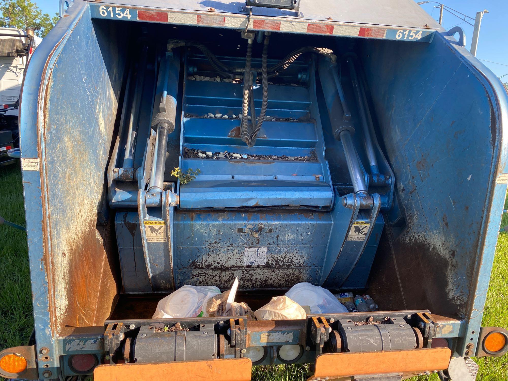 2008 Crane Carrier Co. Loadmaster Rear Packer Garbage Truck
