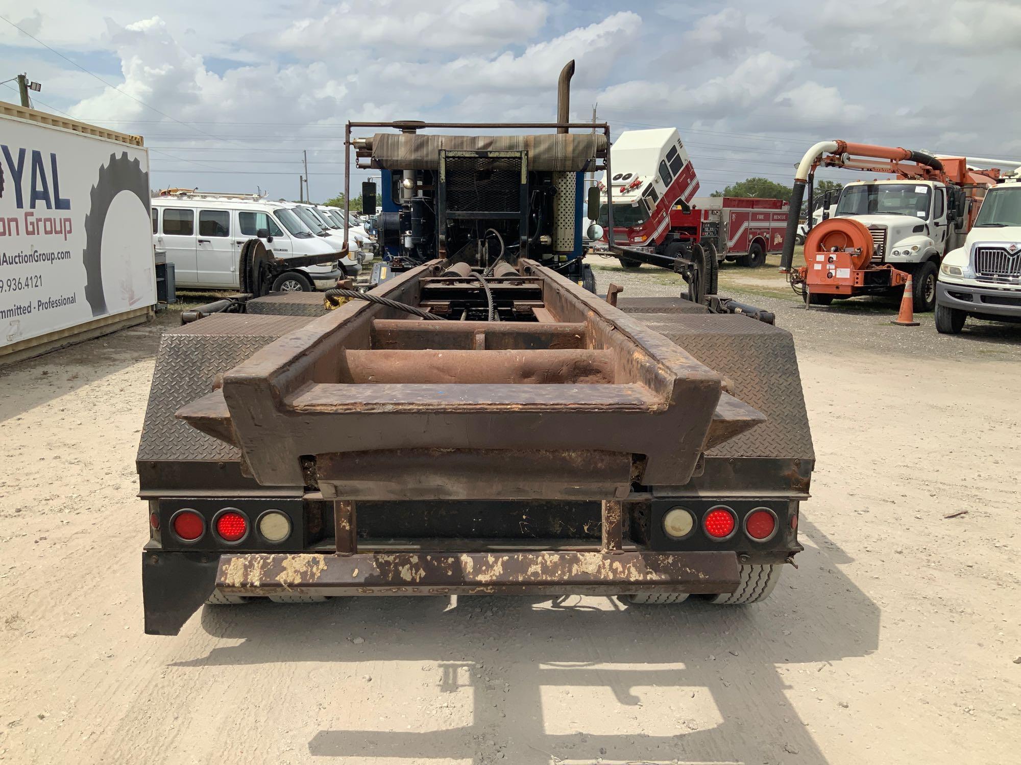 2002 Crane Carrier Co Roll Off Truck