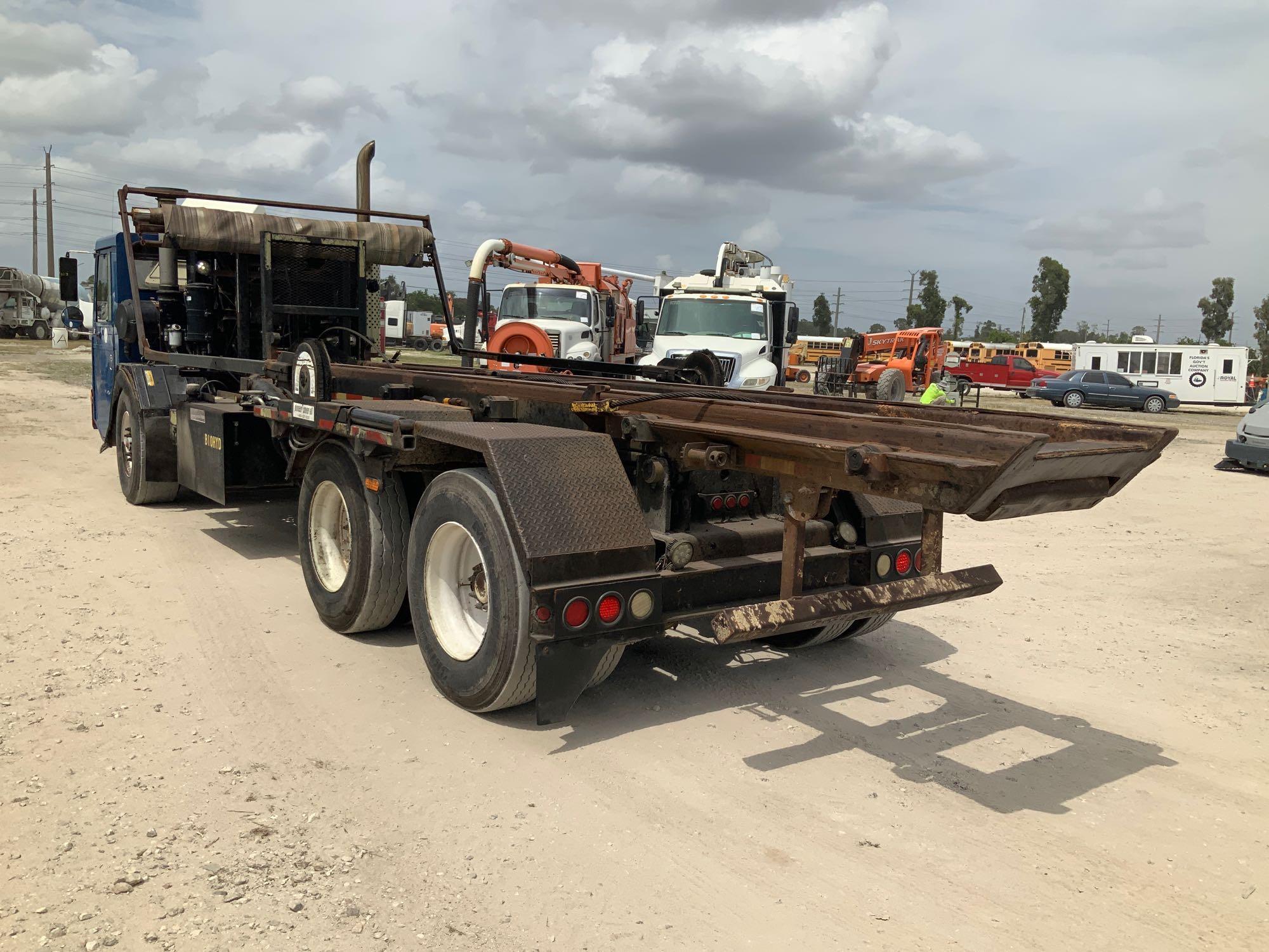 2002 Crane Carrier Co Roll Off Truck