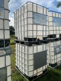 Set of Two Skid Mounted Caged Poly Tanks