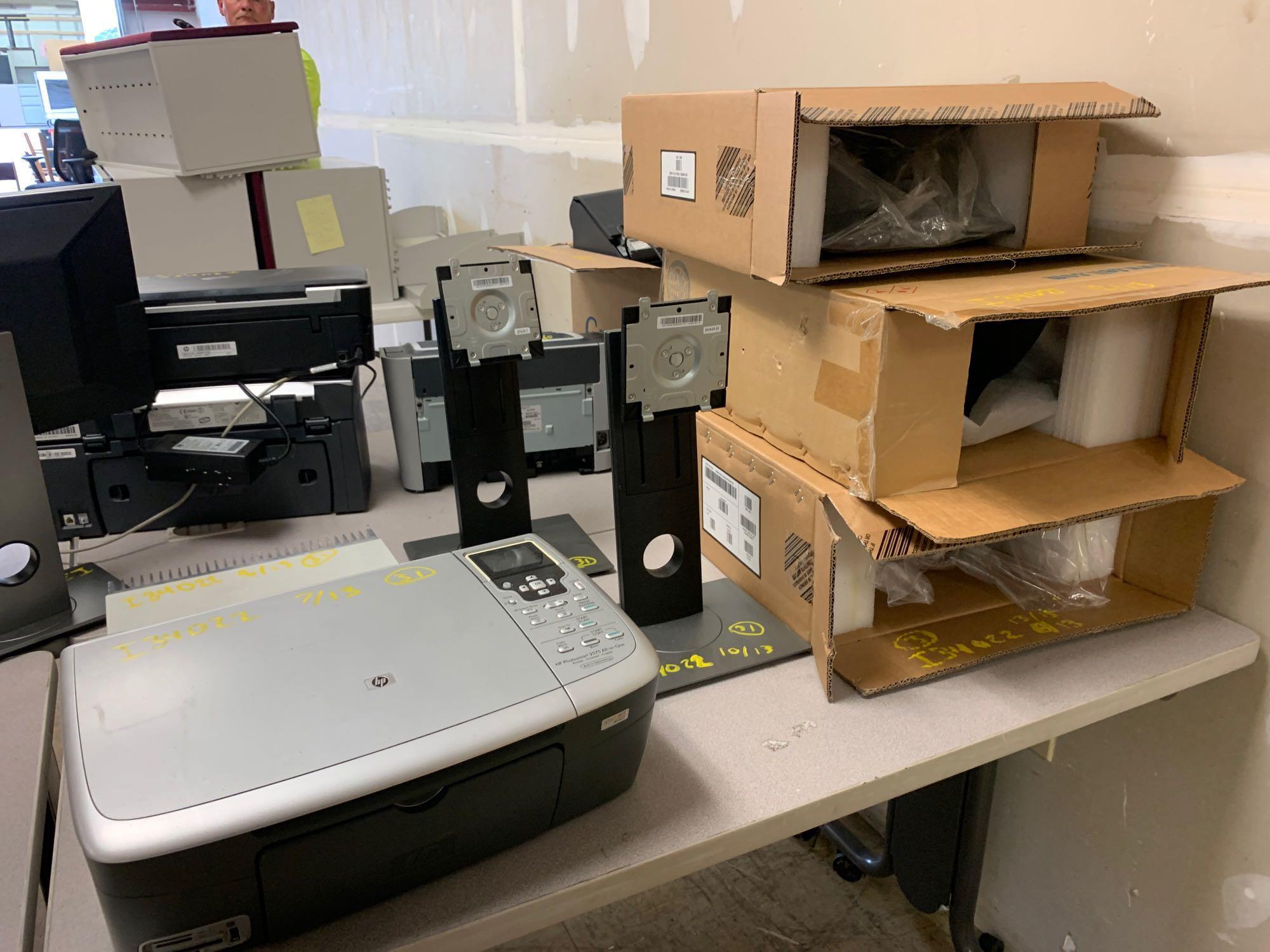 Misc Electronics (3 Dock Sta, Box of Misc, 2 Monitors, 2 Monitor Stands, 4 Printer/Scanners,