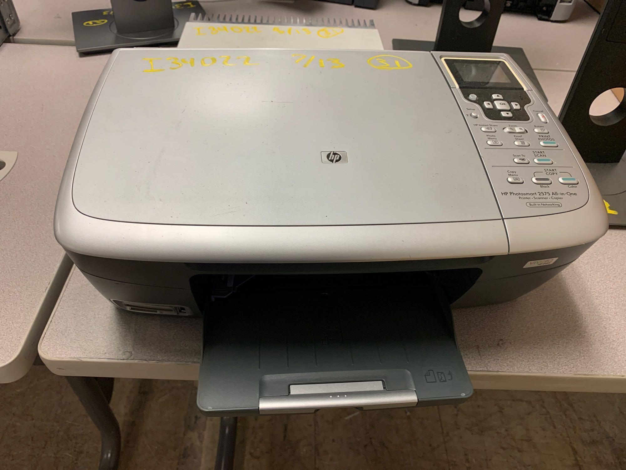 Misc Electronics (3 Dock Sta, Box of Misc, 2 Monitors, 2 Monitor Stands, 4 Printer/Scanners,