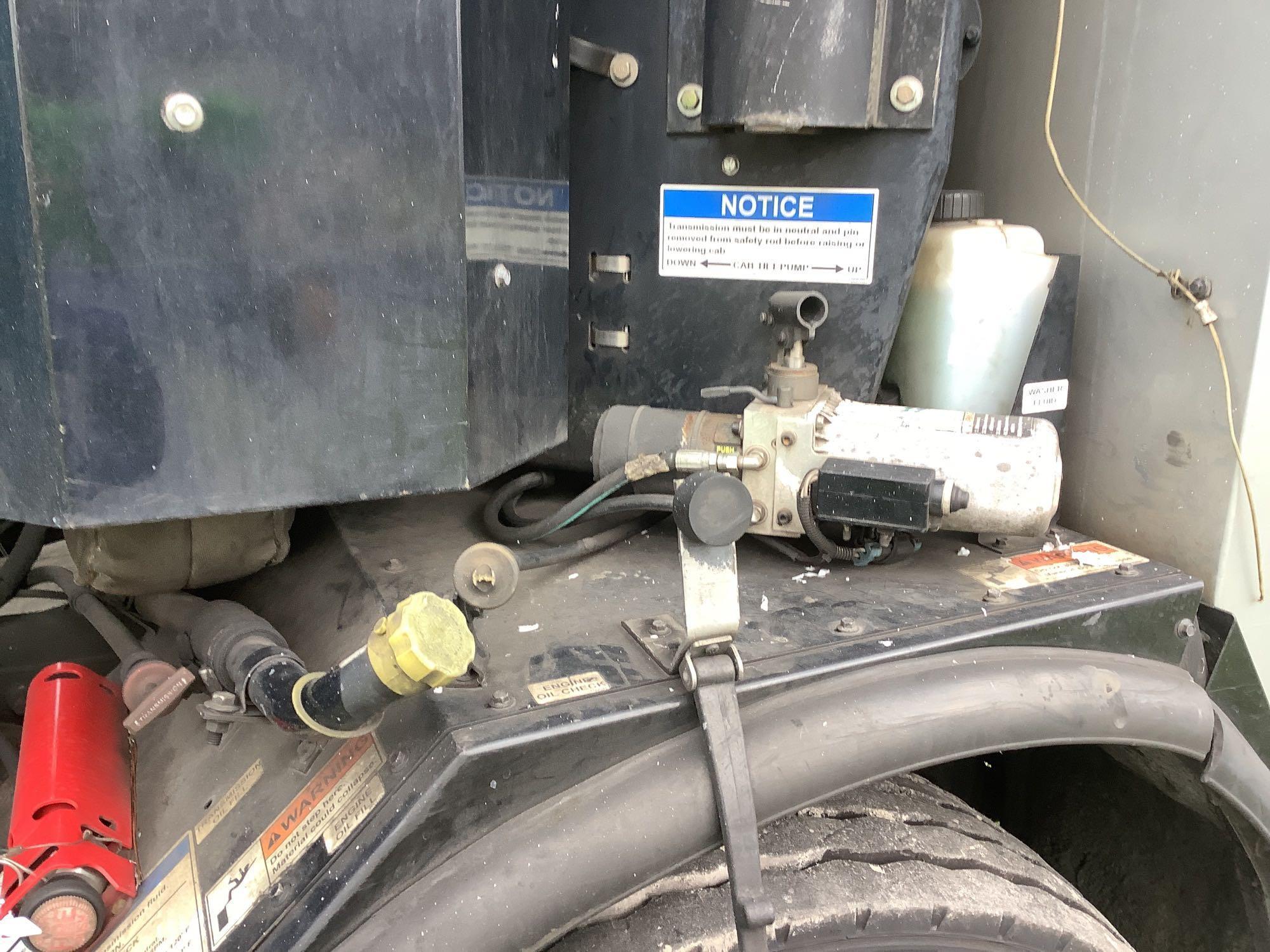 2013 Crane Carrier Co. Low Entry Rear Packer Garbage Truck