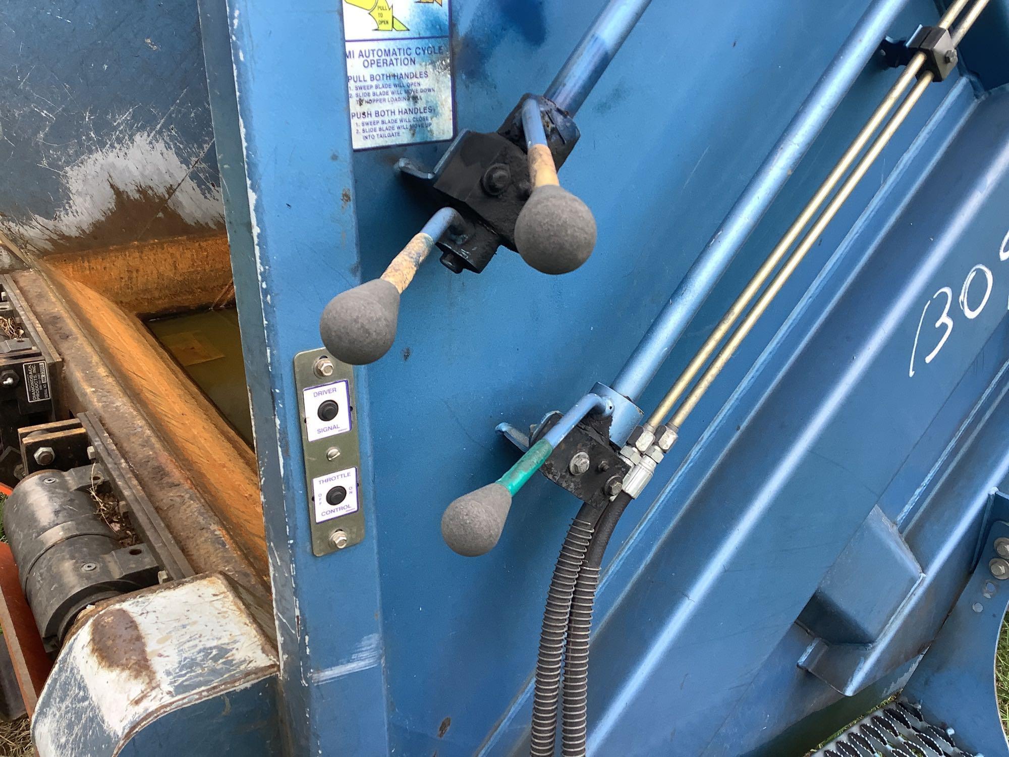 2013 Crane Carrier Co. Low Entry Rear Packer Garbage Truck