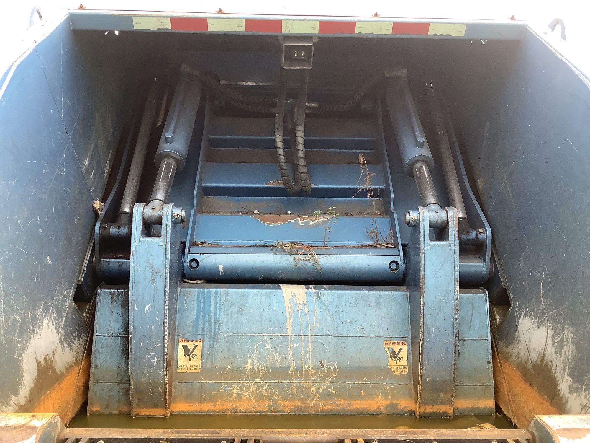2013 Crane Carrier Co. Low Entry Rear Packer Garbage Truck