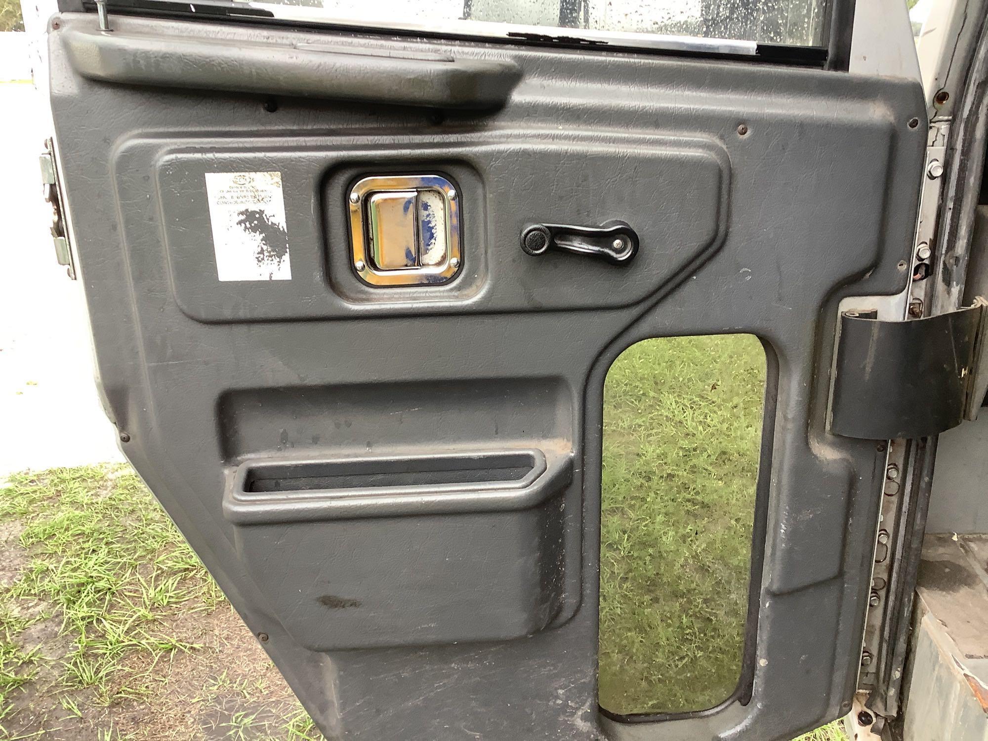 2013 Crane Carrier Co. Low Entry Rear Packer Garbage Truck