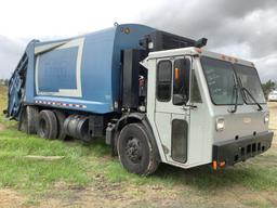 2013 Crane Carrier Co. Low Entry Rear Packer Garbage Truck