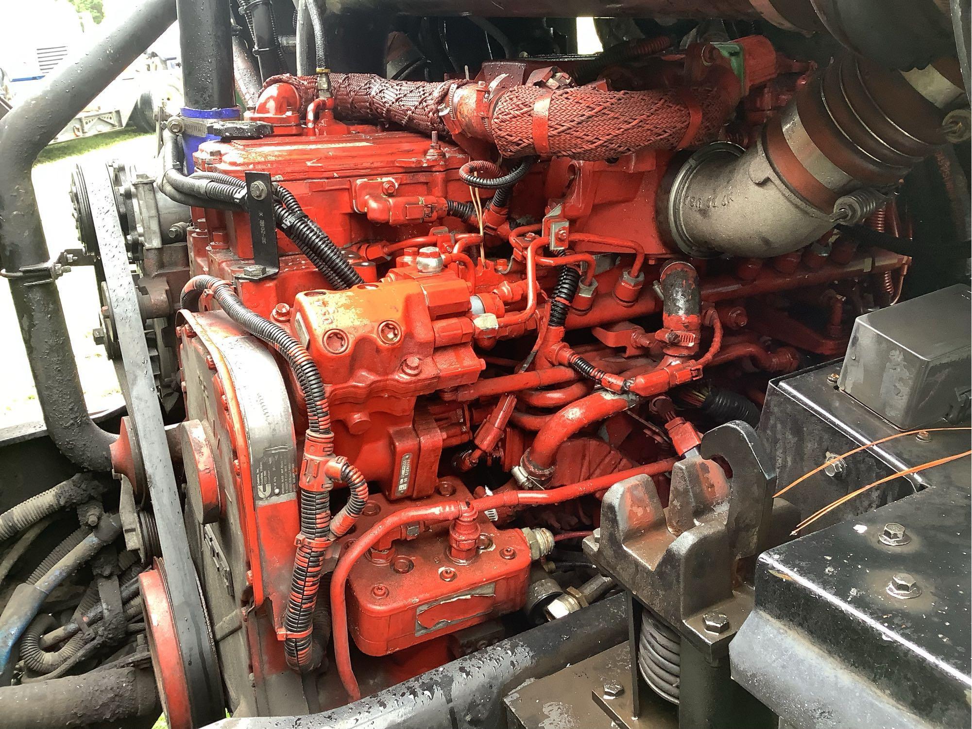 2013 Crane Carrier Co. Low Entry Rear Packer Garbage Truck