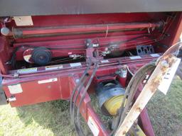 M & W 5596 Round Baler.