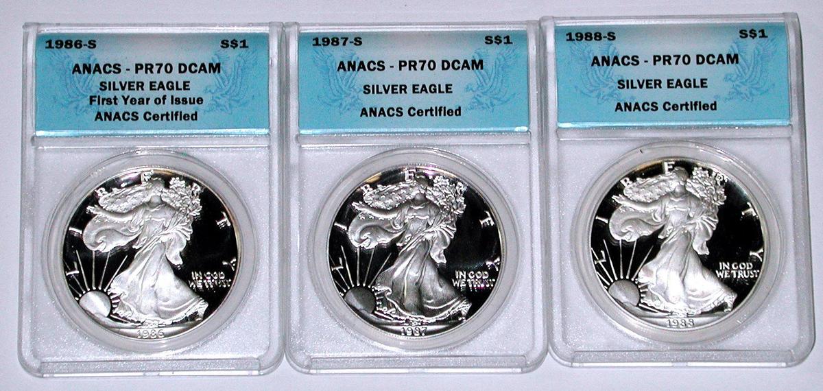 THREE (3) ANACS PR70 DCAM PROOF SILVER EAGLES - 1986-S, 1987-S, 1988-S