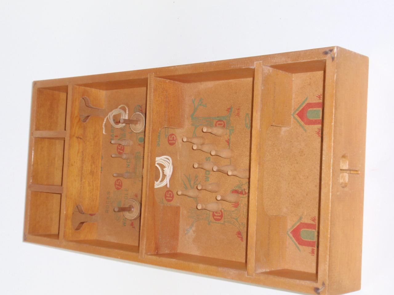 A Carrom "Fox Hunt" Skittles Game