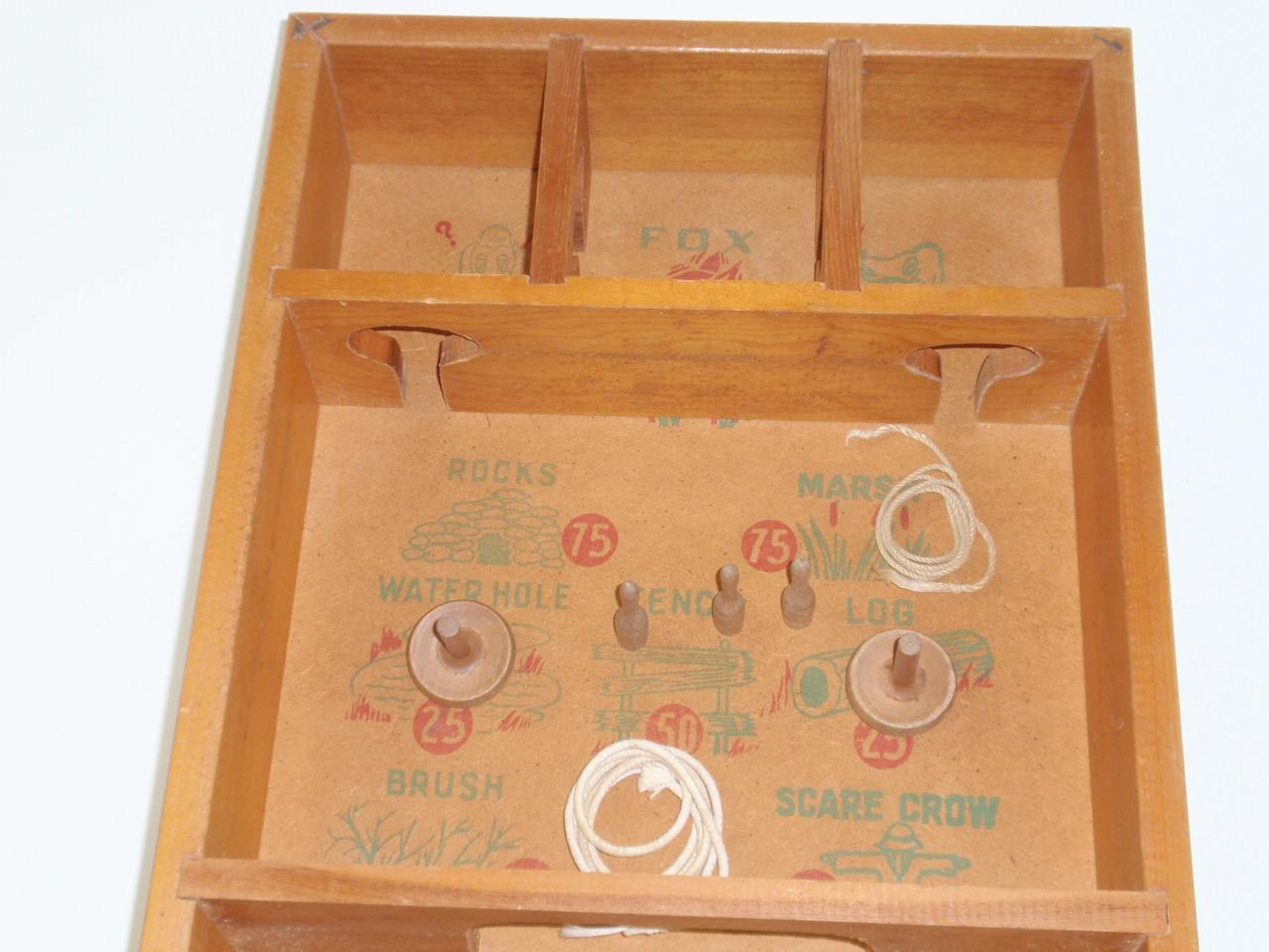 A Carrom "Fox Hunt" Skittles Game