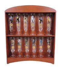 Elvis Presley Pilsner Glass Collection in orig wooden rack w/12 glasses, Elvis portrayed through ...