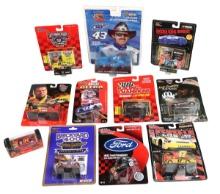 NASCAR Collectibles (10), mostly 1/64 scale in bubble packs, Mint cond, largest 7"L.