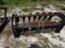Root/brush grapple skid steer attachment