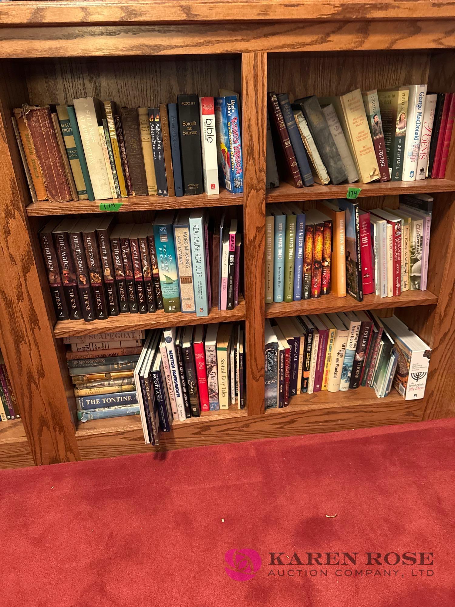 upstairs two shelf units of books