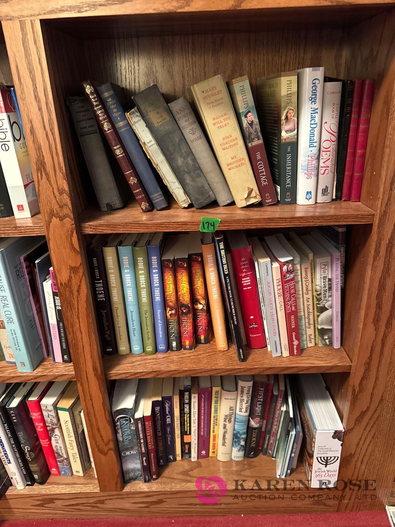 upstairs two shelf units of books