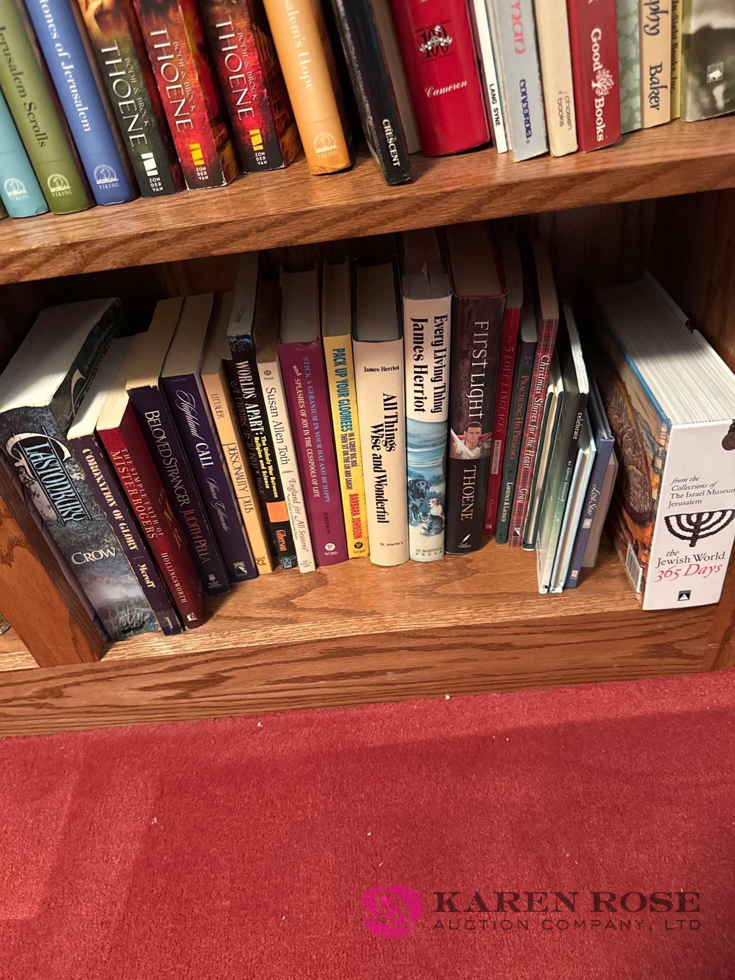 upstairs two shelf units of books