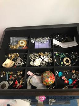 standing jewelry box with costume jewelry -bedroom closet