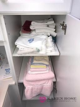 Cleaning supplies/baskets/shelf/step ladder/towels/wash cloths-bathroom