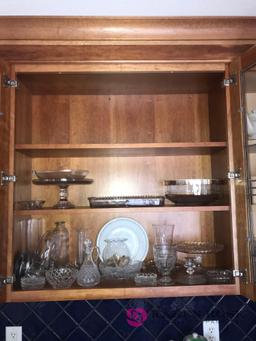 several pieces of crystal glassware