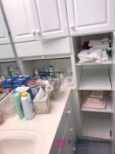 Cleaning supplies/baskets/shelf/step ladder/towels/wash cloths-bathroom