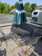 48 inch round patio table with four chairs and umbrella