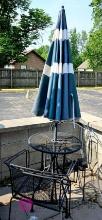 24 inch round patio table with two chairs and umbrella
