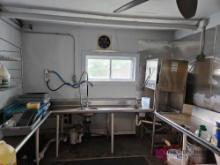 Automatic dishwashing system with grease trap