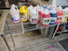 Forty eight inch wire rack with cleaning supplies