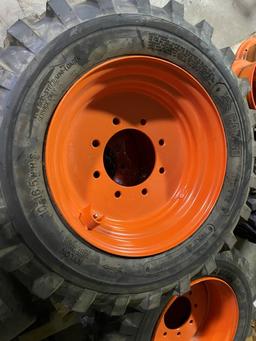 set of 4 NEW skid steer tires & wheels