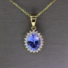 Tanzanite Oval Cut 1 Carat Center Stone Surrounded by Diamonds with Yellow Gold Chain! (Vault_Q)
