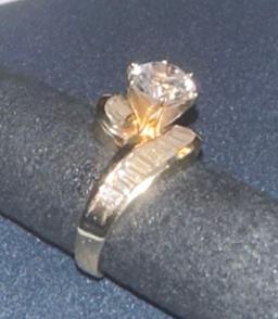 14 karat ring, 4.7 g total weight CZ diamond.