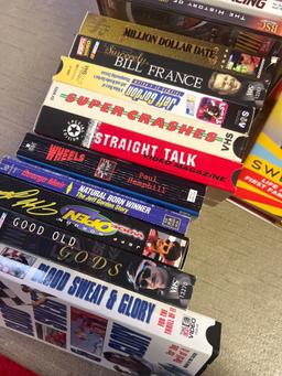 NASCAR books and movies in basement