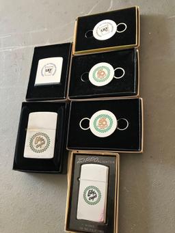 3- Lily cups zippo lighters/tape measure/key chains