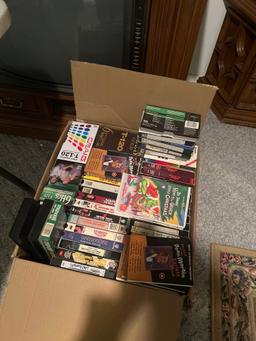 VHS Movies and Taped Cubes Games