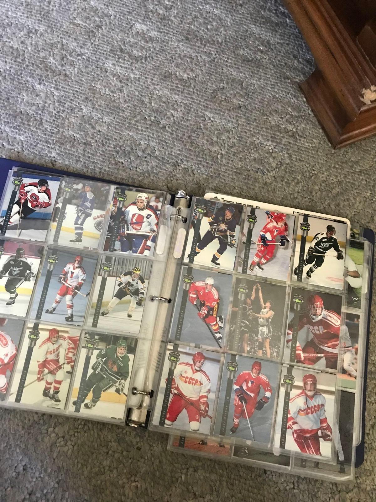 Assorted sports cards/living rm