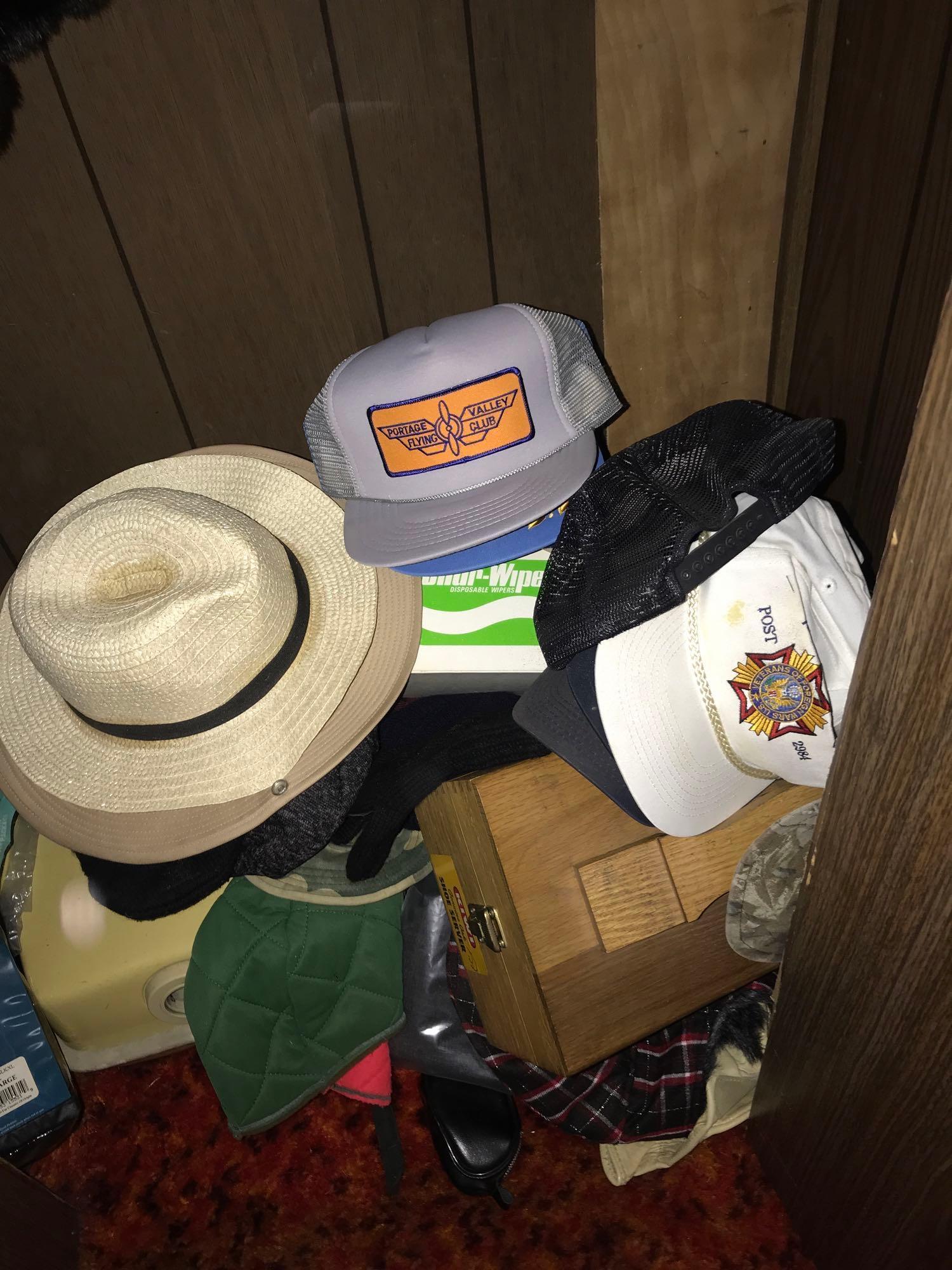 Closet in front - hats/gloves/canister vacuum