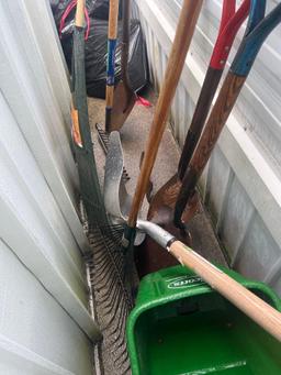 Yard tools and trashcan