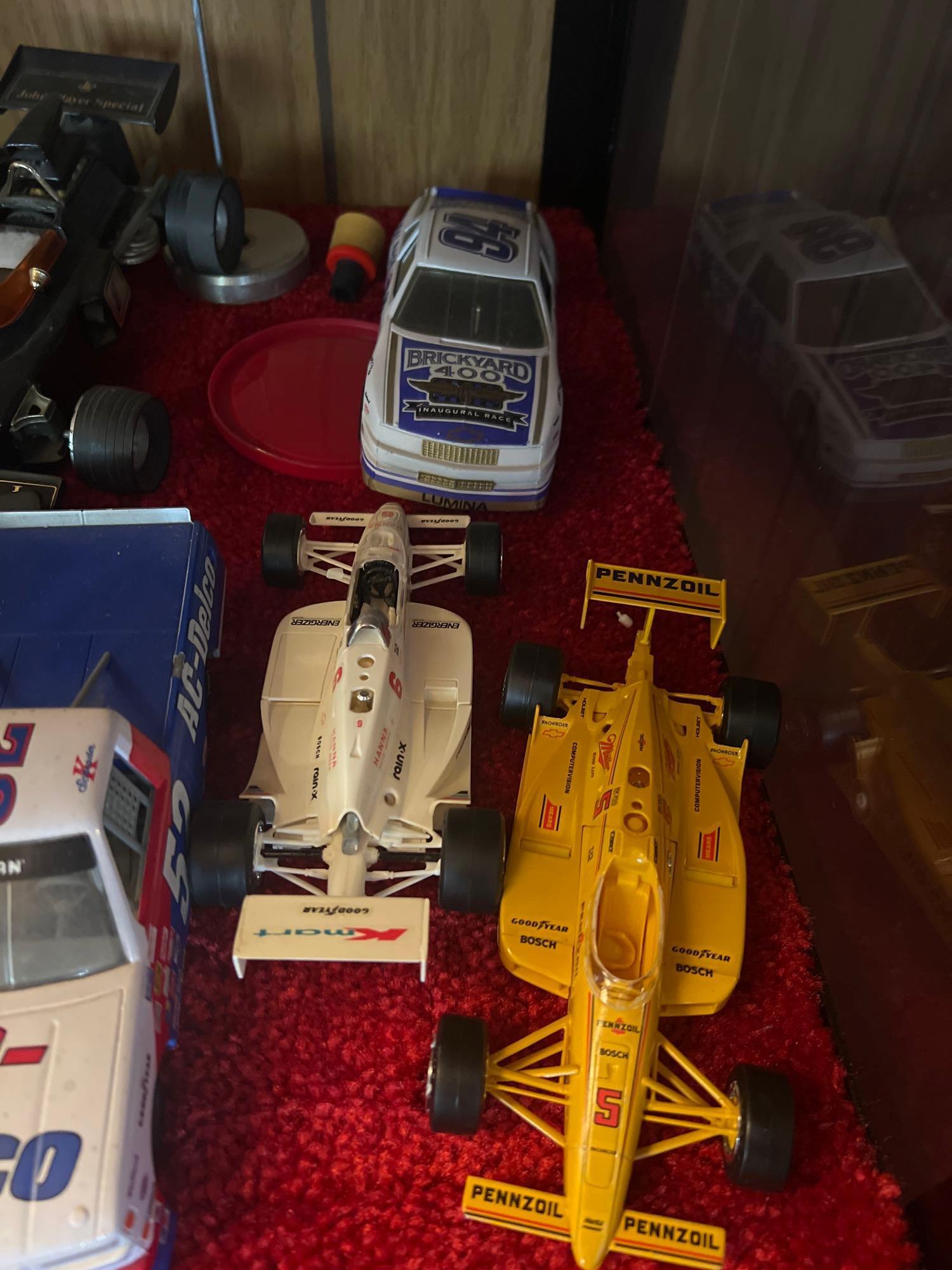 11 collectors cars NASCAR lot