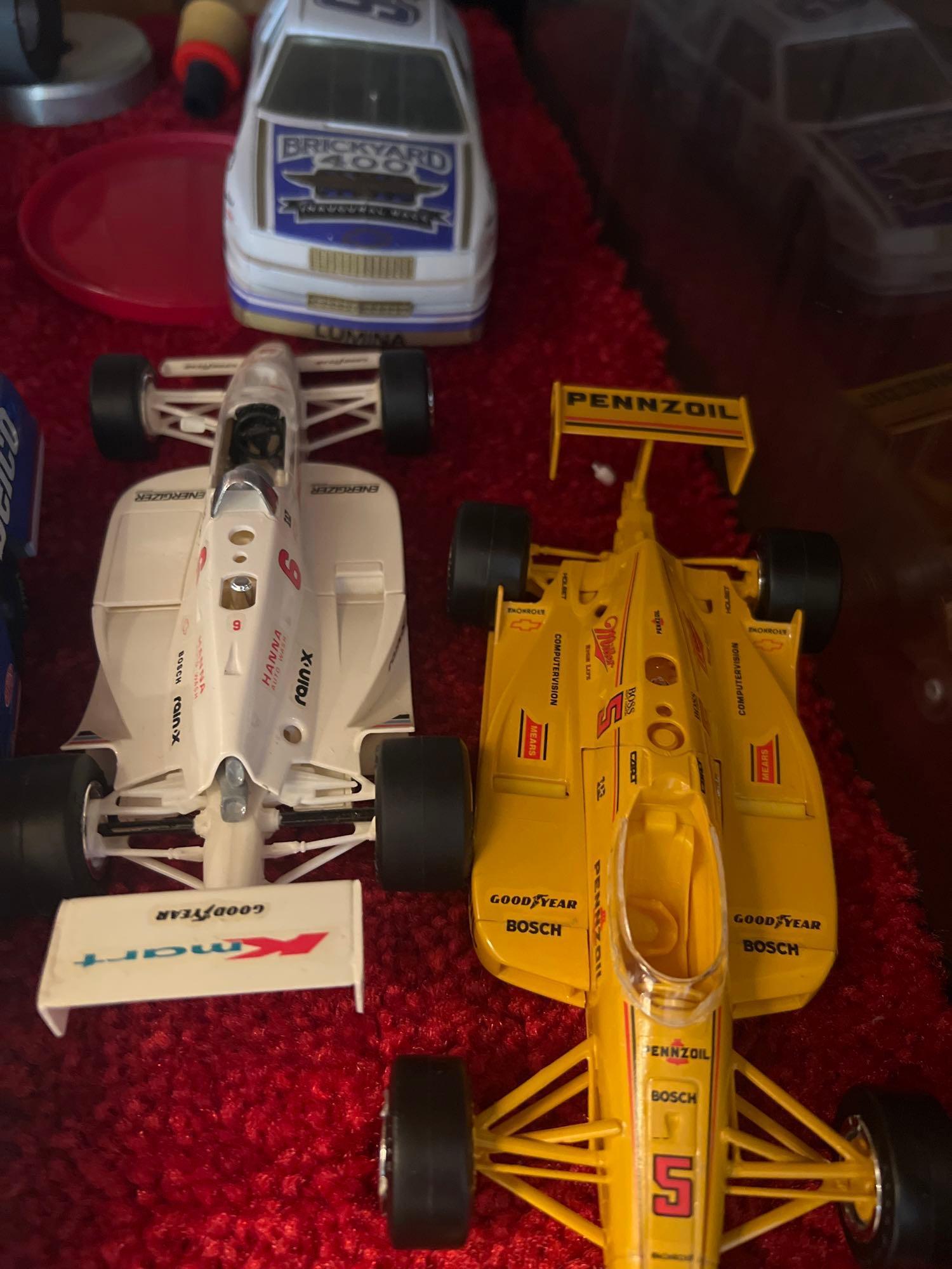 11 collectors cars NASCAR lot